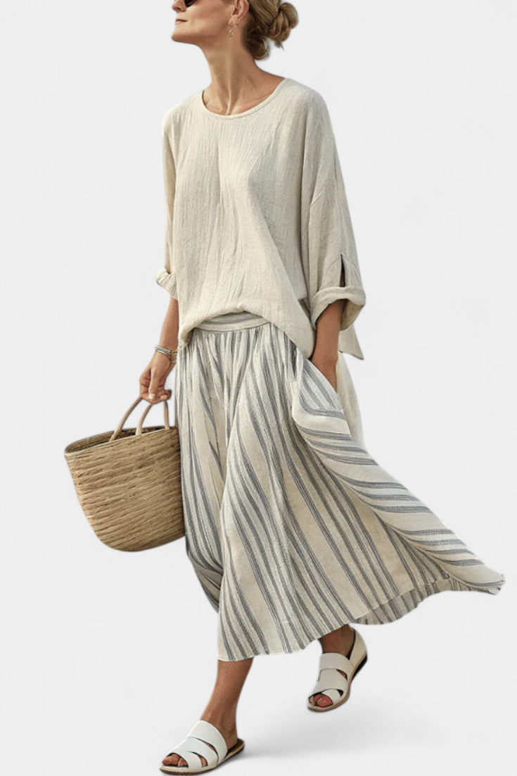 Aurora — Comfortable blouse and striped midi skirt