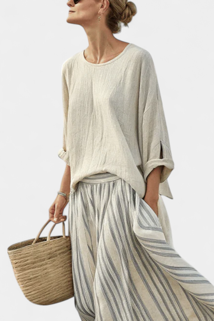 Aurora — Comfortable blouse and striped midi skirt