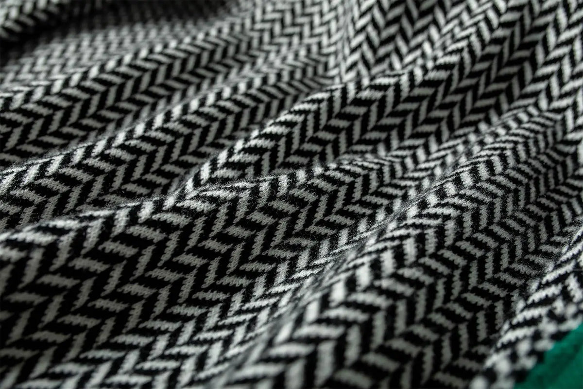 JANELLE – HERRINGBONE HIGH-NECK SWEATER